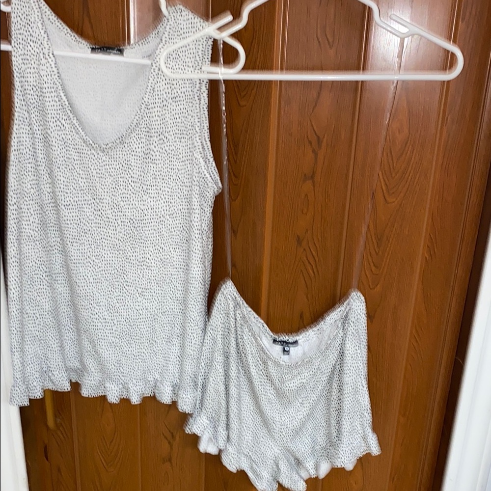2 Piece White Sleeveless Top and shorts